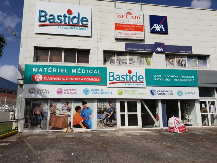 Enseigne Habillage de façade Vitrophanie